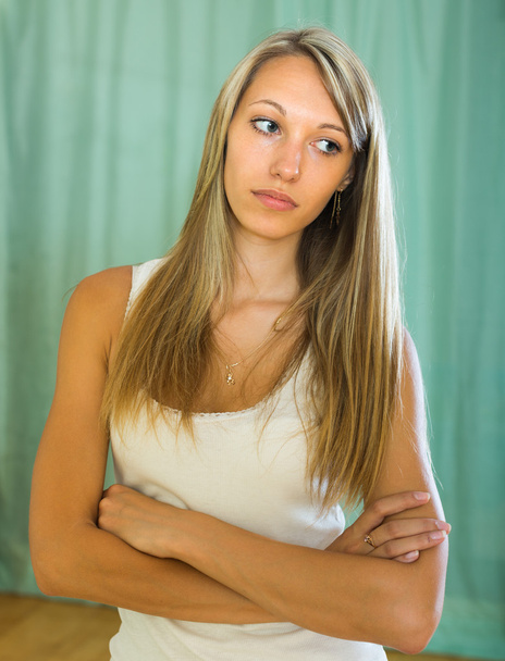 Blonde unhappy woman at home - Foto, imagen