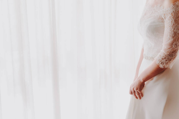 Detail of an elegant white wedding dress, with blank space for designs, copy space. - Foto, Imagen