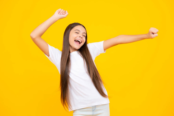 Excited teenager, glad amazed and overjoyed emotions. Portrait of emotional positive teenage child girl shouting in amazement or astonishment face, astonished with surprise - 写真・画像