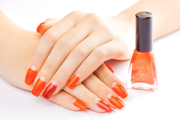 manicure. applying red nail polish. isolated - Photo, image