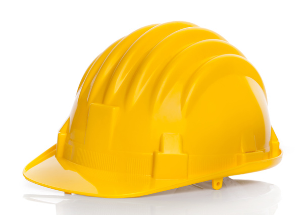 geïsoleerde gele helm - Foto, afbeelding