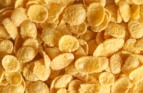 Corn-flakes background and texture, cereal. Top view. cornflake cereal box for morning breakfast. - Photo, Image