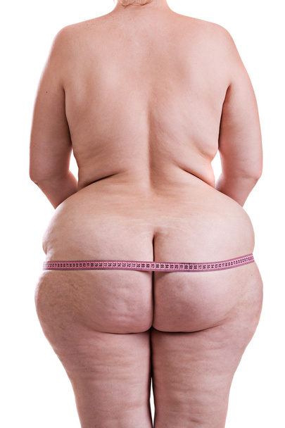 Measurement of pelvic girl with cellulite - Foto, afbeelding