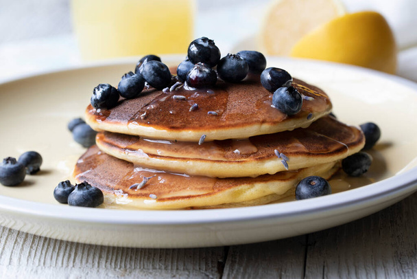 Light Lavendar and Lemon Pancakes with Blueberries - 写真・画像