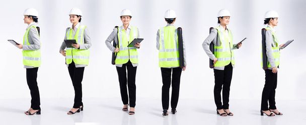 Full length 20s young Mix Race engineer architect client Woman, 360 front side rear back, wear safety vast hardhat tablet. Office female stands feels smile happy over white background isolated - Photo, Image