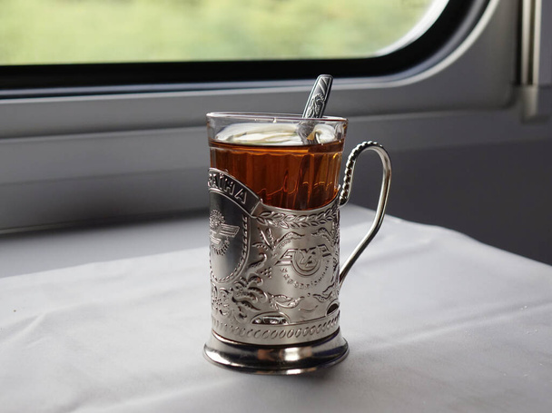 Ukrzaliznytsia branded tea in the train car - Zdjęcie, obraz