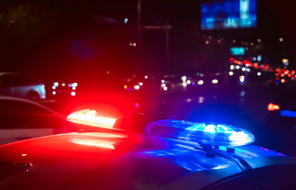 police car in night light stree - Valokuva, kuva