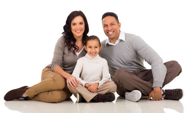 Young family sitting - Foto, Imagen