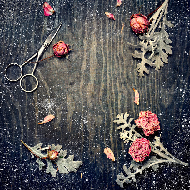 Vintage winter roses background on wooden texture - 写真・画像