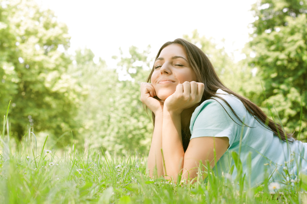 Beautiful girl dreaming outdoor - Photo, Image