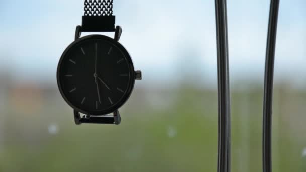 Elegant wrist watch. Close-up on a blurred background. - Filmagem, Vídeo