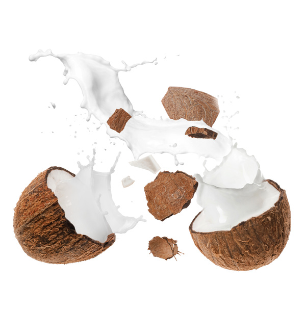 Rozbitý kokos a šplouchnutí mléka izolovaného na bílém - Fotografie, Obrázek