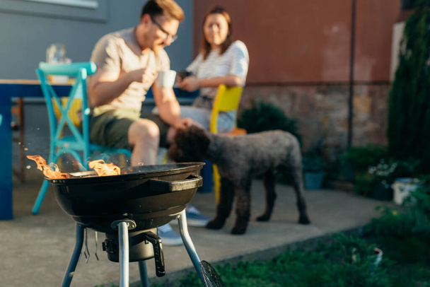 close up of barbecue. happy family in blurred background - Foto, immagini