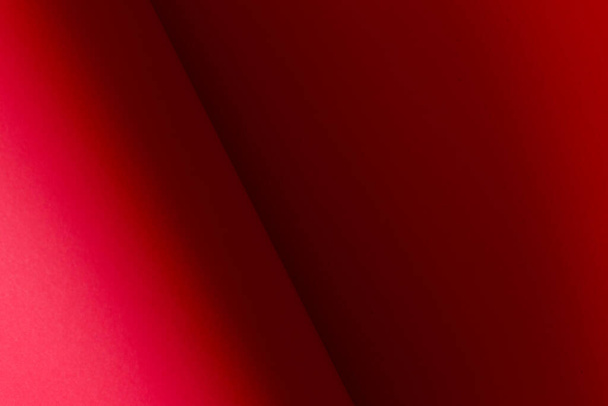 Abstraktní červené skládaný barevný papír pozadí - Fotografie, Obrázek