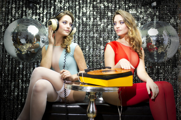 two beautiful sexy disco women  - Foto, Bild