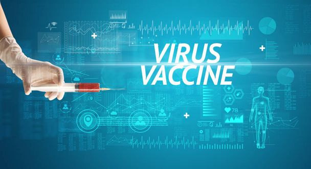 Syringe needle with virus vaccine and VIRUS VACCINE inscription, antidote concept - Valokuva, kuva