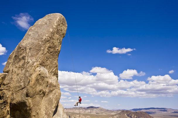 Rock climber rappelling. - Photo, Image