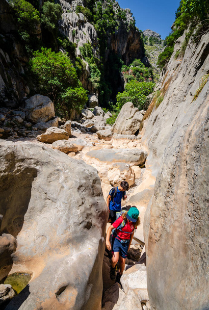hikers on Torrent de Pareis, Sa Calobra, Majorca, Balearic Islands, Spain - 写真・画像