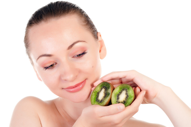 Young woman with slices of kiwi - Photo, Image