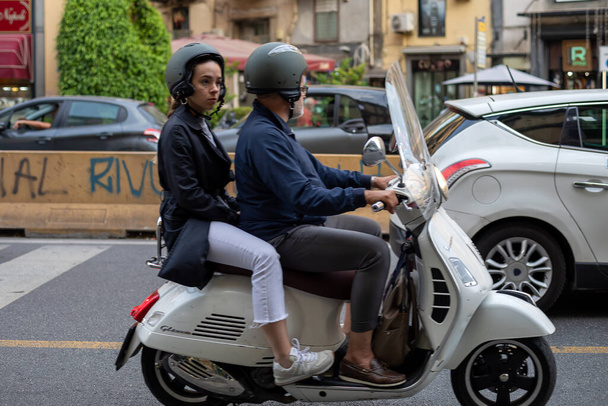 Naples, Italy - May 25, 2022: The citizens of Naples love to move around the city using the moped as a preferential means of transport. - 写真・画像