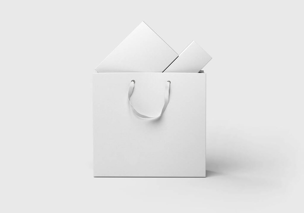 Bolsa de compras con cajas aisladas sobre fondo blanco. Representación 3D. Mock-up. - Foto, imagen