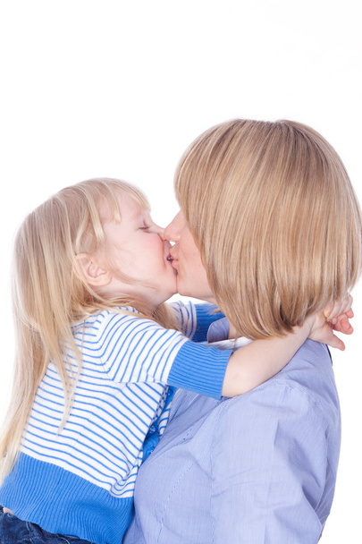 Child embrace and kiss happy mom - 写真・画像