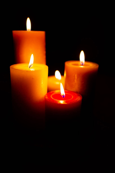Burning red candles on black background copy space - Foto, Imagem