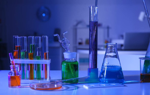Chemical glassware on table in medical laboratory - Photo, Image