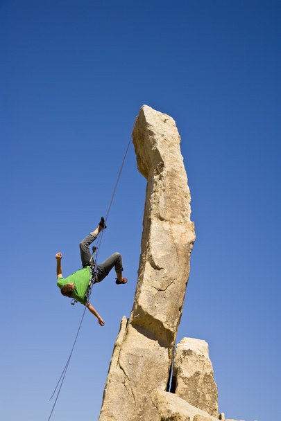 Rock climber rappelling. - Photo, Image