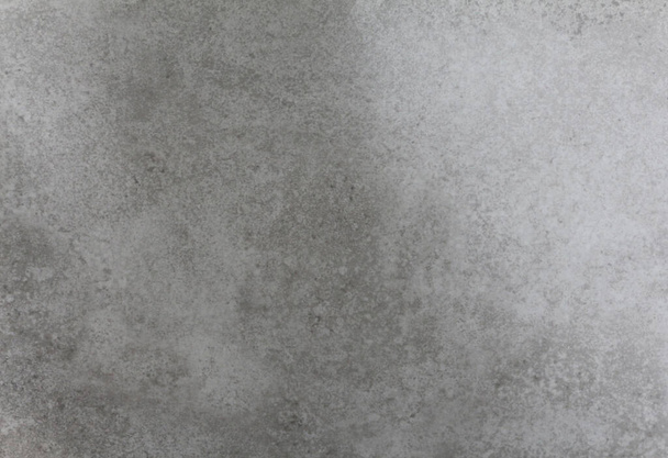 Granite abstract background texture. Ceramic decorative tile for bathroom or kitchen in different shades of grey and white. Easily add depth to your designs. - Photo, image