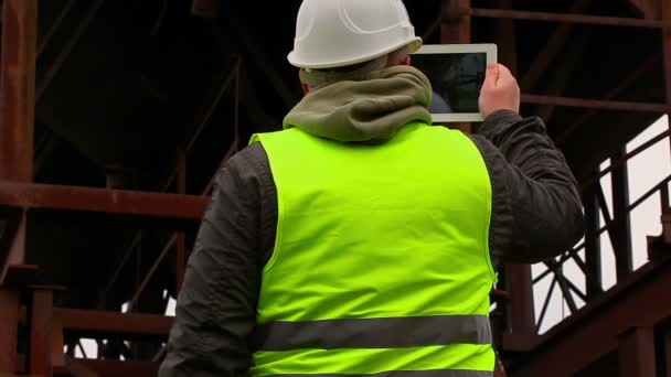 Engineer filmed with tablet PC - Footage, Video
