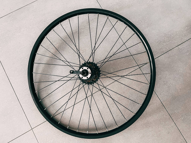 MTB wheel on a floor. Mountain bike aluminum double-wall rim disc. - 写真・画像