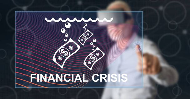 Muž s vr sluchátky dotýkající se konceptu finanční krize na dotykovém displeji prstem - Fotografie, Obrázek