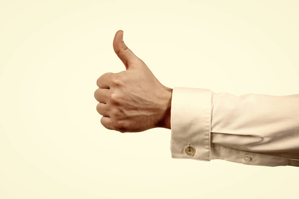 approval gesture of thumb up with male hand isolated on white, approvement. - Фото, зображення