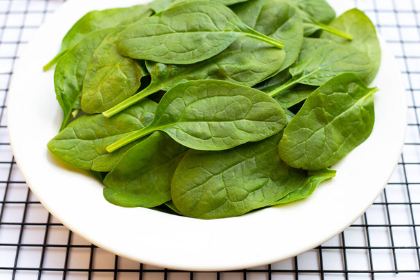 Spinach leaves. Extremely nutrient-rich vegetable - Zdjęcie, obraz