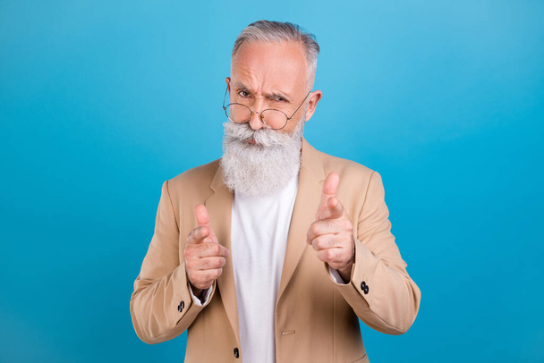 Portrait of handsome classy intellectual grey-haired man professor pointing at you isolated over bright blue color background. - Fotoğraf, Görsel