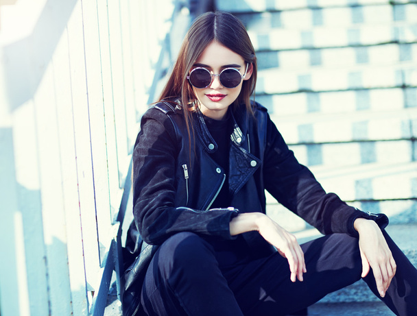fashion model in sunglasses posing outdoor - Фото, изображение