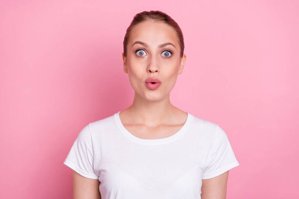 Photo of young woman amazed shocked surprised omg wow fake novelty news isolated over pink color background. - Foto, Bild