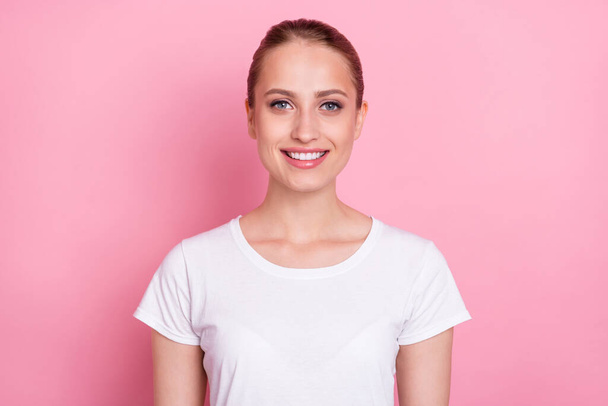 Photo of happy positive young woman smile good mood wear white t-shirt isolated on pastel pink color background. - Fotó, kép