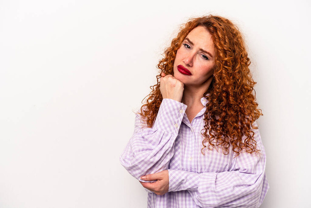 Young ginger caucasian woman isolated on white background who feels sad and pensive, looking at copy space. - Φωτογραφία, εικόνα