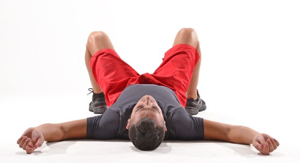 Exhausted athletic man - Фото, изображение