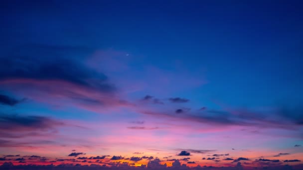 Time lapse of beautiful sunrise landscape Amazing light of nature cloudscape sky and Clouds moving away rolling colorful dark sunrise or sunset clouds Footage timelapse.Nature environment background - Footage, Video