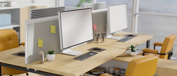 Современный стильный дизайн интерьера офисных рабочих станций с компьютерным макетом на деревянном столе и стильными желтыми креслами. 3D рендеринг, 3D иллюстрация - Фото, изображение