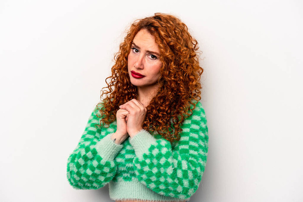 Young ginger caucasian woman isolated on white background scared and afraid. - Фото, зображення