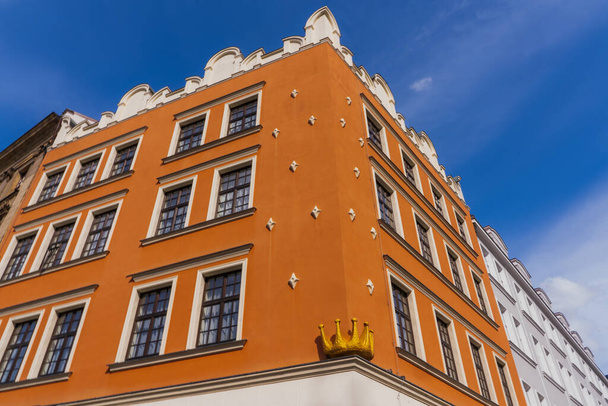 Low angle view of building corner on urban street in Wroclaw - Photo, Image