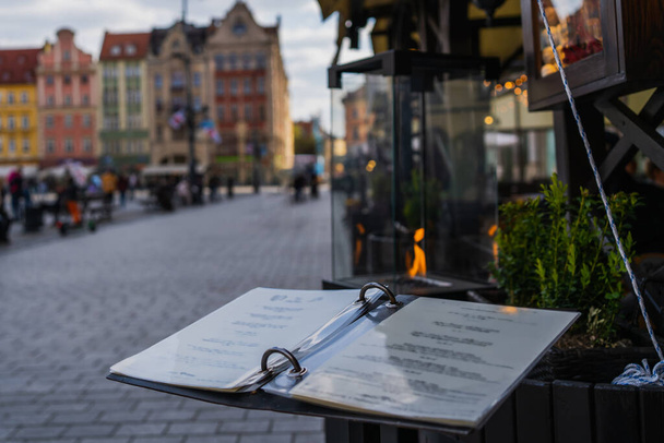 Restaurant menu on urban street in Wroclaw - Photo, Image