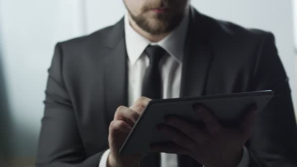 Businessman Using Digital Tablet at Work. - Video, Çekim