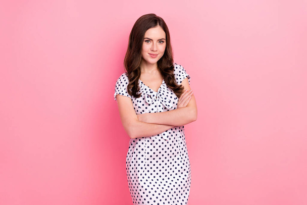 Photo of cute shiny woman wear white dress arms folded smiling isolated pink color background. - 写真・画像