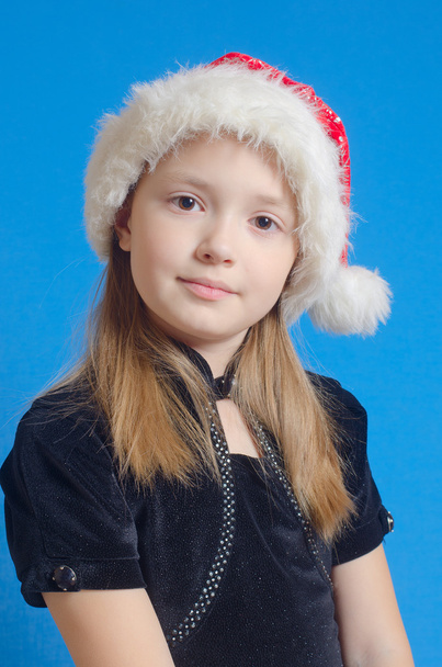 Дівчина підліток у Санта Клауса капелюх - Фото, зображення