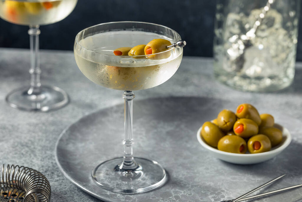 Boozy Refreshing Dry Gin Martini with Olive Garnish - 写真・画像